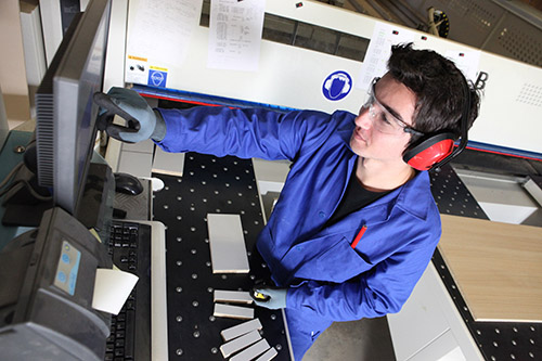 Man using touchscreen gloves at work